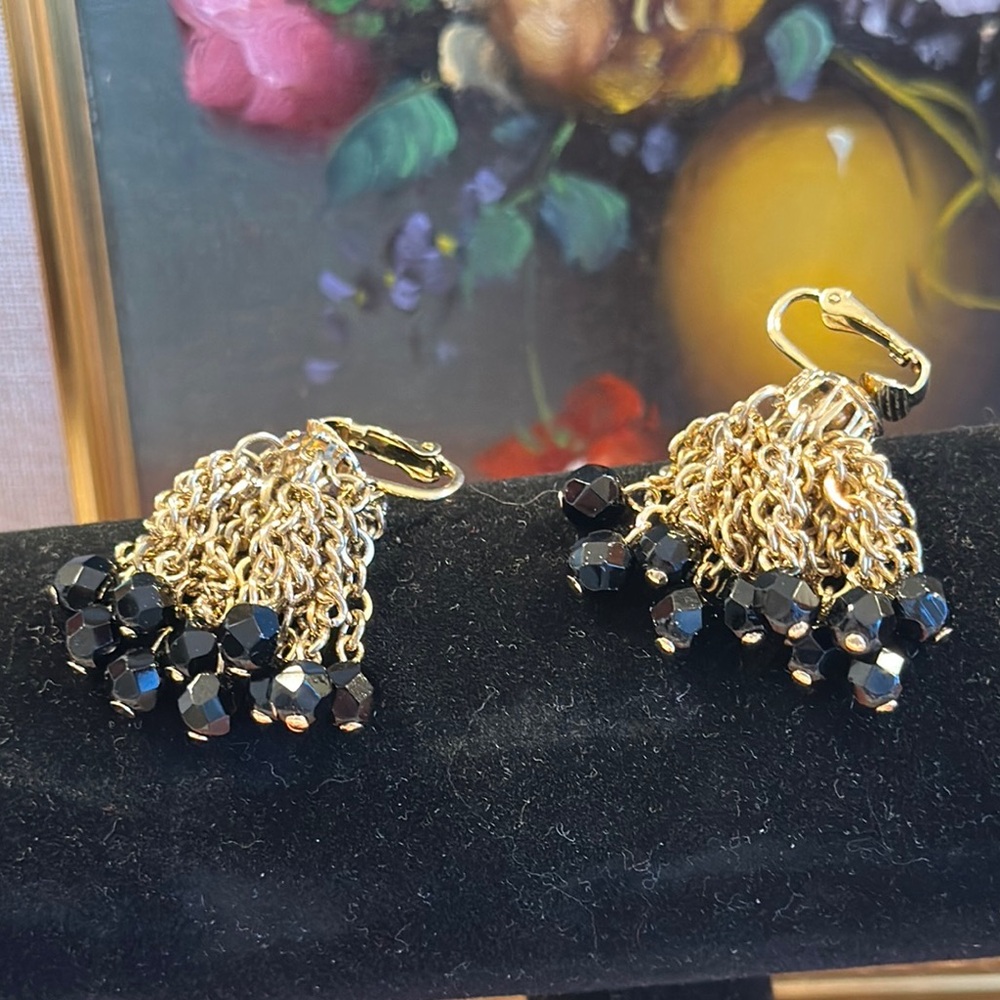 Vintage clip earrings w/Gold Dangle Chains ending with black glass faceted beads